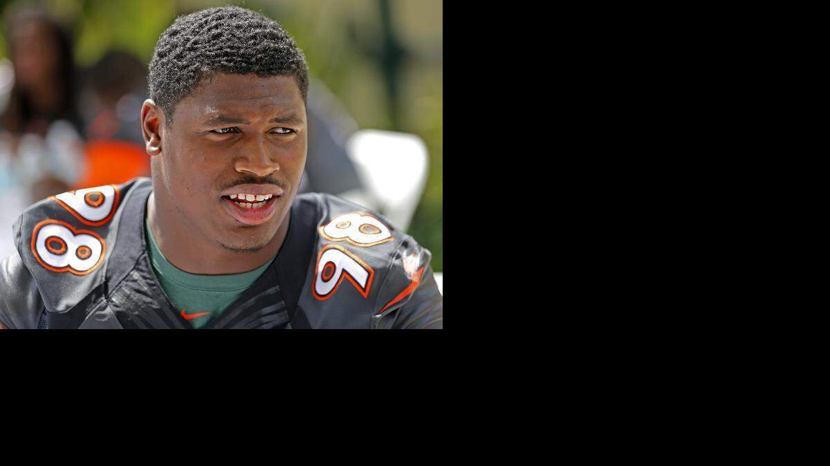 
Al-Quadin Muhammad is seen during media day at the University of Miami on Friday, Aug. 15, 2014.
