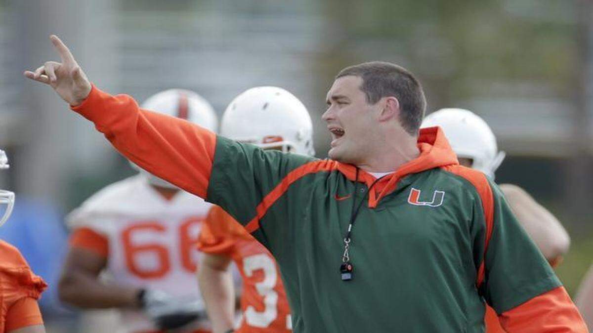 
File photo: Brennan Carroll gestures during practice as University of Miami football players participate in Spring drills on campus in Coral Gables on March 8, 2011.
