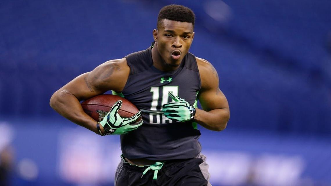 Miami defensive back Deon Bush runs a drill at the NFL football scouting combine in Indianapolis, Monday, Feb. 29, 2016.