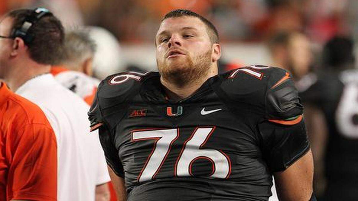 
Injured: UM’s Taylor Gadbois sits with ice on his knee after leaving the game against Duke in the fourth quarter. 
