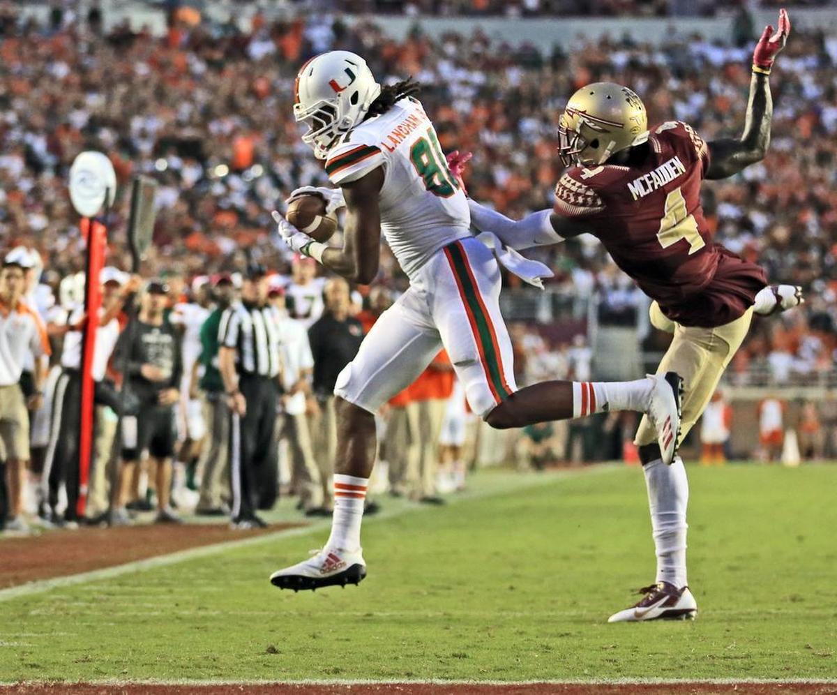 Miami Hurricanes wide receiver Darrell Langham scores the final touchdown in the fourth quarter as Florida State Seminoles defensive back Tarvarus McFadden fails to defend on Saturday, October 7, 2017.