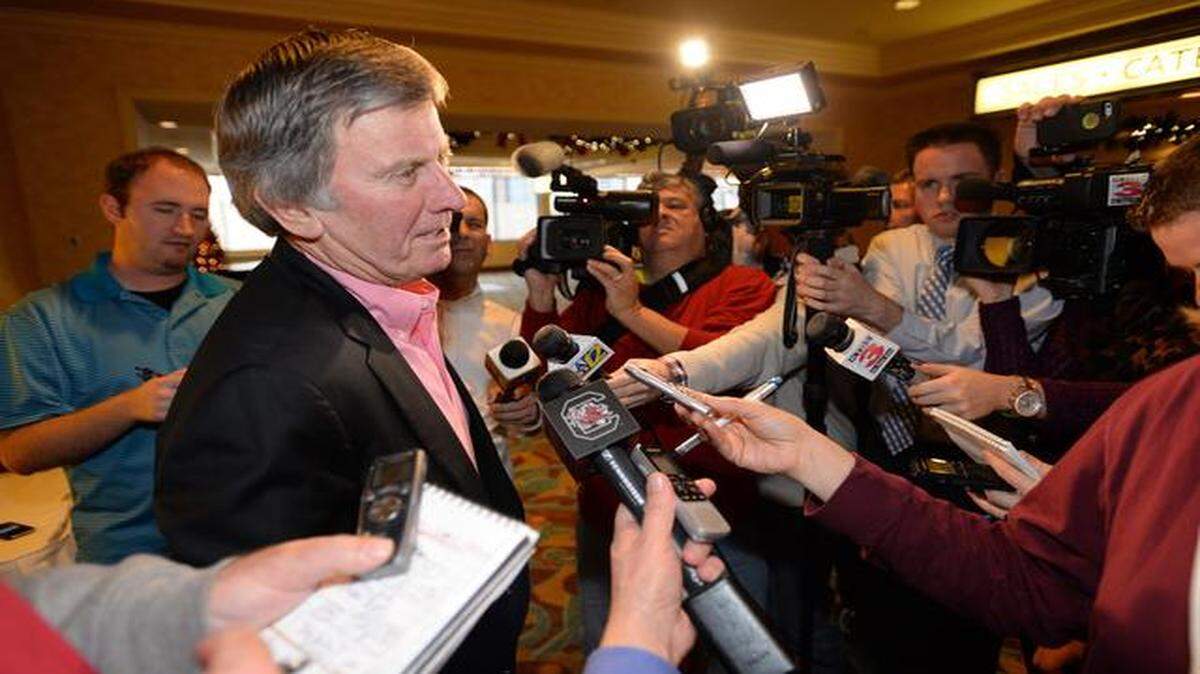 
South Carolina coach Steve Spurrier talks to the media after arriving at a hotel on Dec. 23, 2014, in Sherveport, La. South Carolina faces Miami in Saturday's Independence Bowl NCAA college football game.
