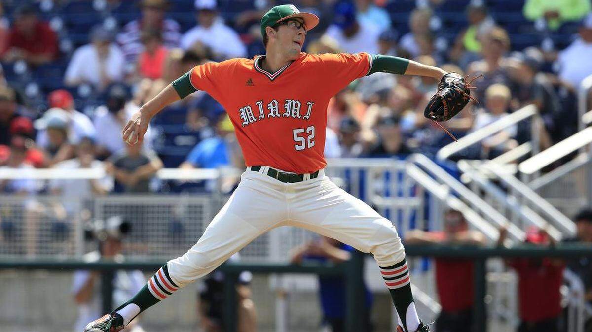 Miami's Frankie Bartow (52) throws during the sixth inning of an NCAA College World Series baseball game against UC Santa Barbara, Monday, June 20, 2016, in Omaha, Neb.