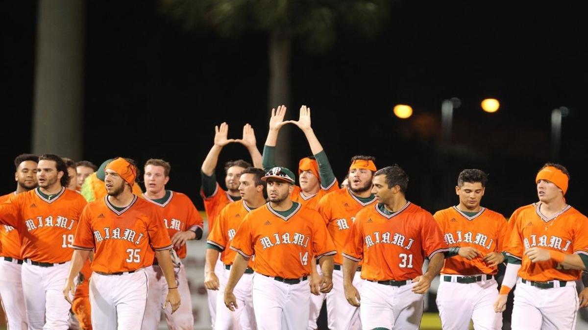 The Miami Hurricanes celebrate after defeating Long Beach State University 9-8 in the NCAA Baseball Championship Coral Gables Regional finals game on June 5, 2016, held at Mark Light Field.