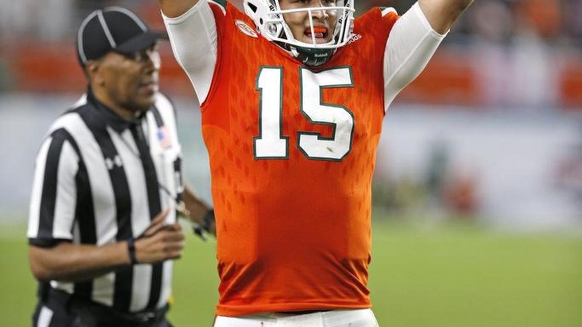 Miami Hurricanes quarterback Brad Kaaya celebrates tight end David Njoku touchdown against Duke at Hard Rock Stadium in Miami Gardens on Saturday, November 26, 2016
