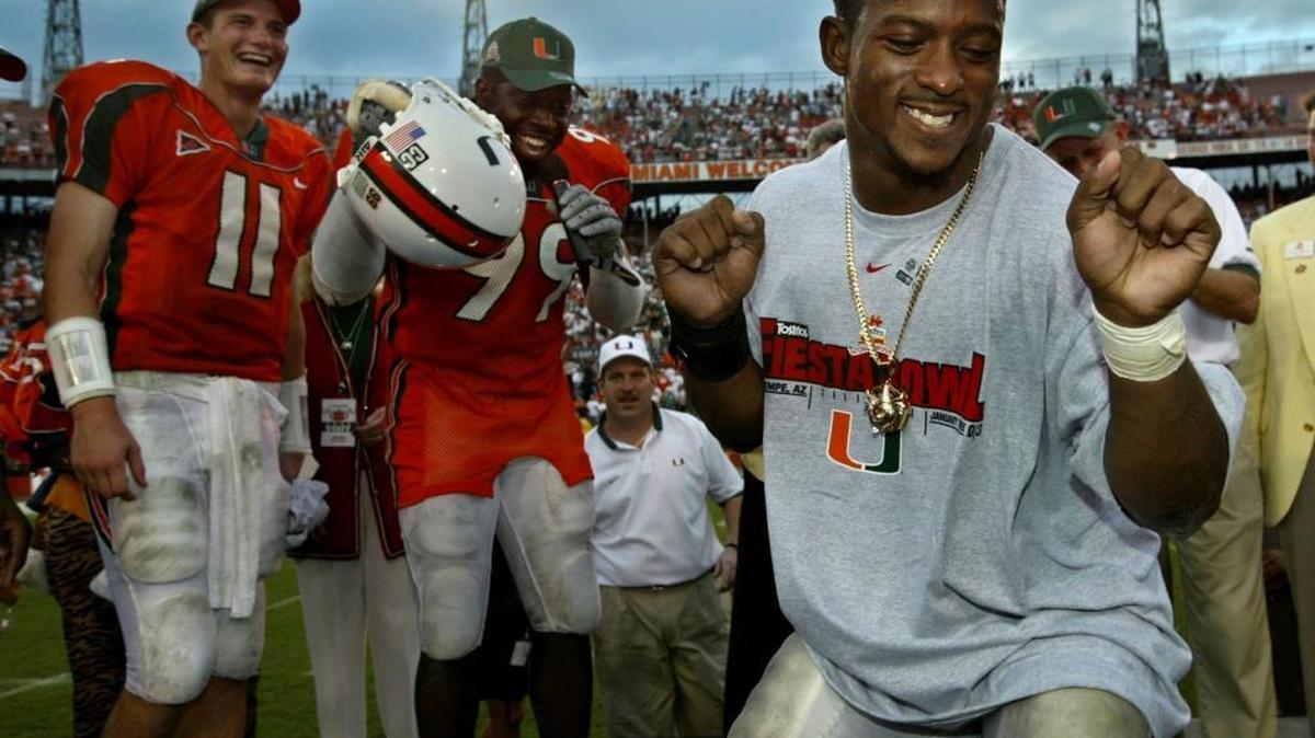 
Willis McGahee does a little dance at midfield as teammates Ken Dorsey (11) and Andrew Williams look on after a 56-45 victory against Virginia Tech on Dec. 7, 2002 at the Orange Bowl in Miami. 
