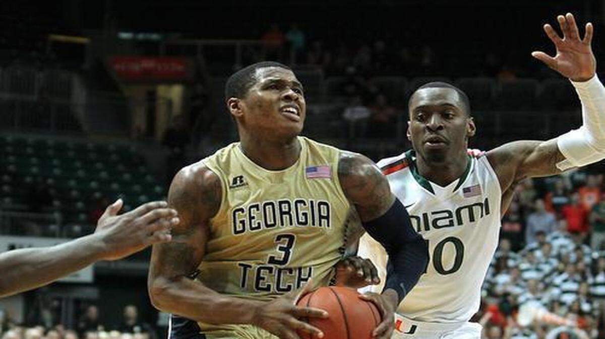 
Georgia Tech Yellow Jackets forward Marcus Georges-Hunt goes to the basket against Miami Hurricanes guard Sheldon McClellan during the second half of their game at the BankUnited Center in Coral Gables on Wednesday, Jan. 28, 2015.

