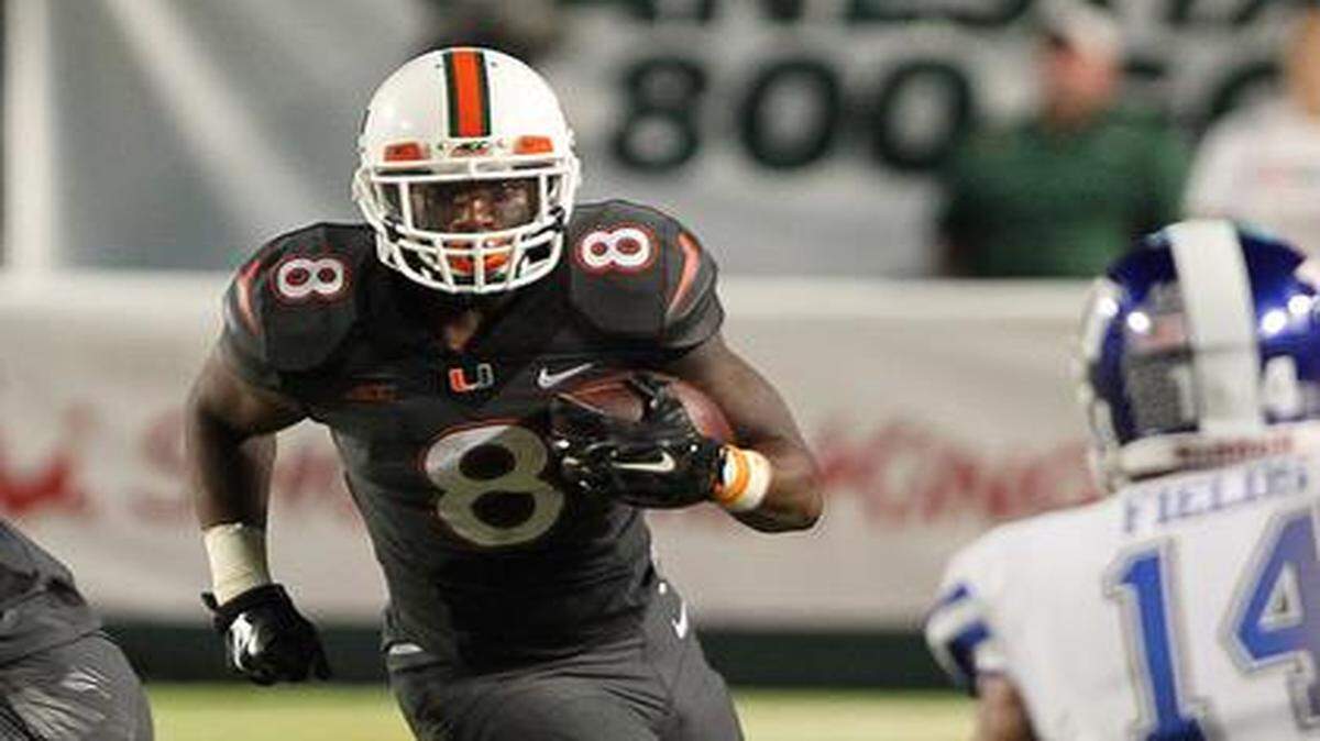 
UM running back, Duke Johnson, cuts the corner for a first down in the first quarter as the University of Miami Hurricanes play the Duke University Blue Devils at SunLife Stadium in Miami Gardens, Florida.
