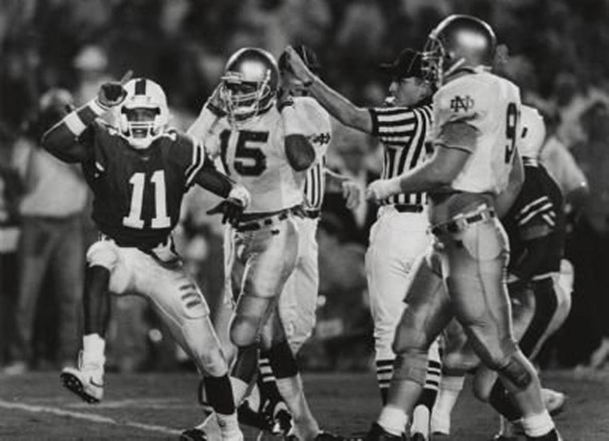 Miami’s Dale Dawkins celebrates a first down during Miami’s 27-10 victory over Notre Dame at the Orange Bowl in 1989.