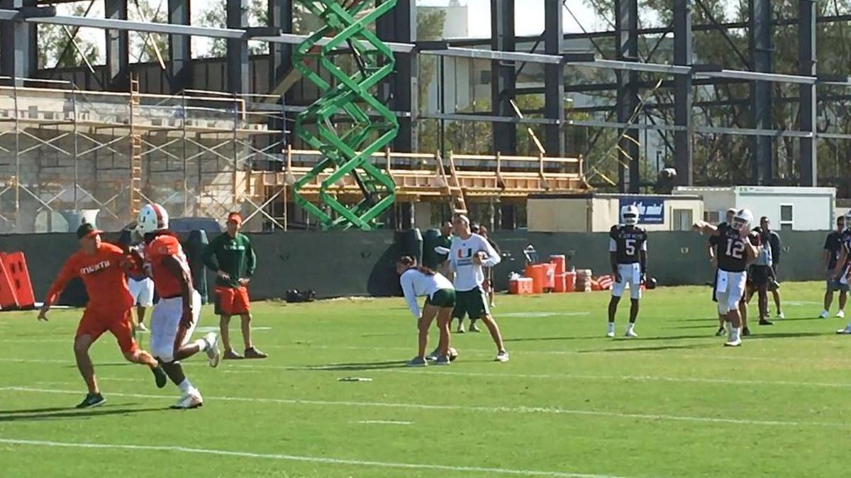 UM quarterbacks Malik Rosier, N’Kosi Perry and Jarren Williams throw to tight ends during a practice this spring.