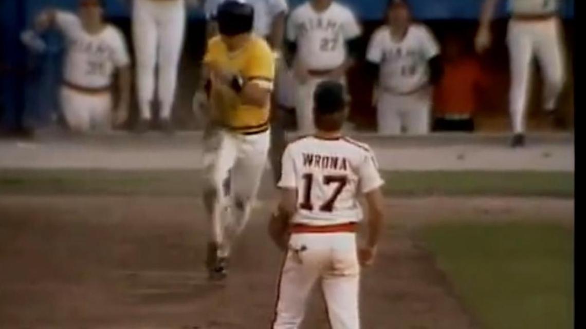 Miami shortstop Billy Wrona covers second and awaits the throw from pitcher Mike Kasprazak as Wichita State’s Phil Stephenson charges ahead thinking Kasprazak’s pickoff throw was wild during a 1982 College World Series game in Omaha.