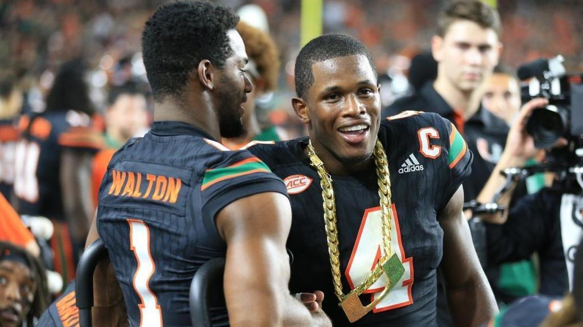 Miami Hurricanes safety Jaquan Johnson receives the turnover chain as the University of Miami hosted Virginia Tech at Hard Rock Stadium on Nov. 4, 2017.