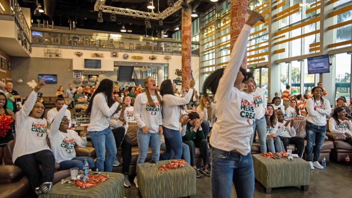 University of Miami women’s basketball players and fans react at the NCAA basketball selection show viewing party at the Rathskeller on UM’s Coral Gables campus on Monday, March 12, 2018.