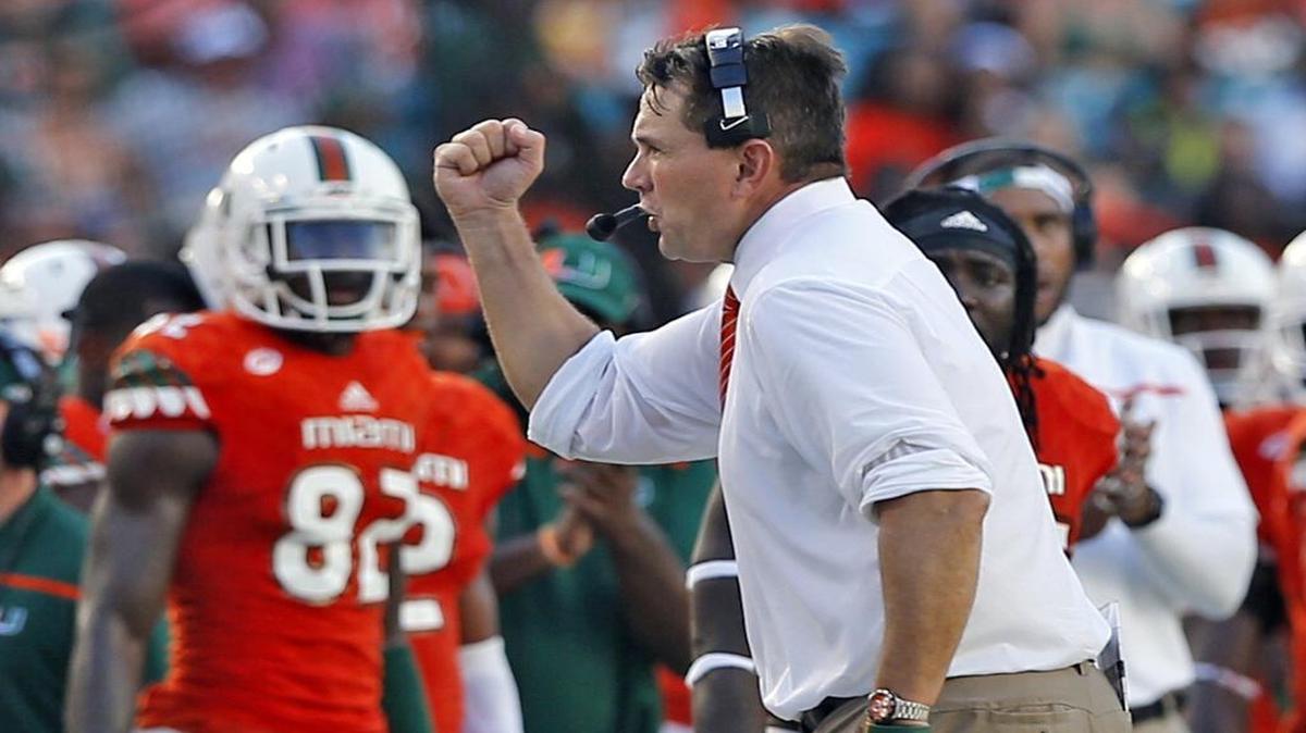 
Miami Hurricanes coach Al Golden celebrates after a third quarter field goal as they play the Nebraska Cornhuskers at Sun Life Stadium in Miami Gardens on September 19, 2015.
