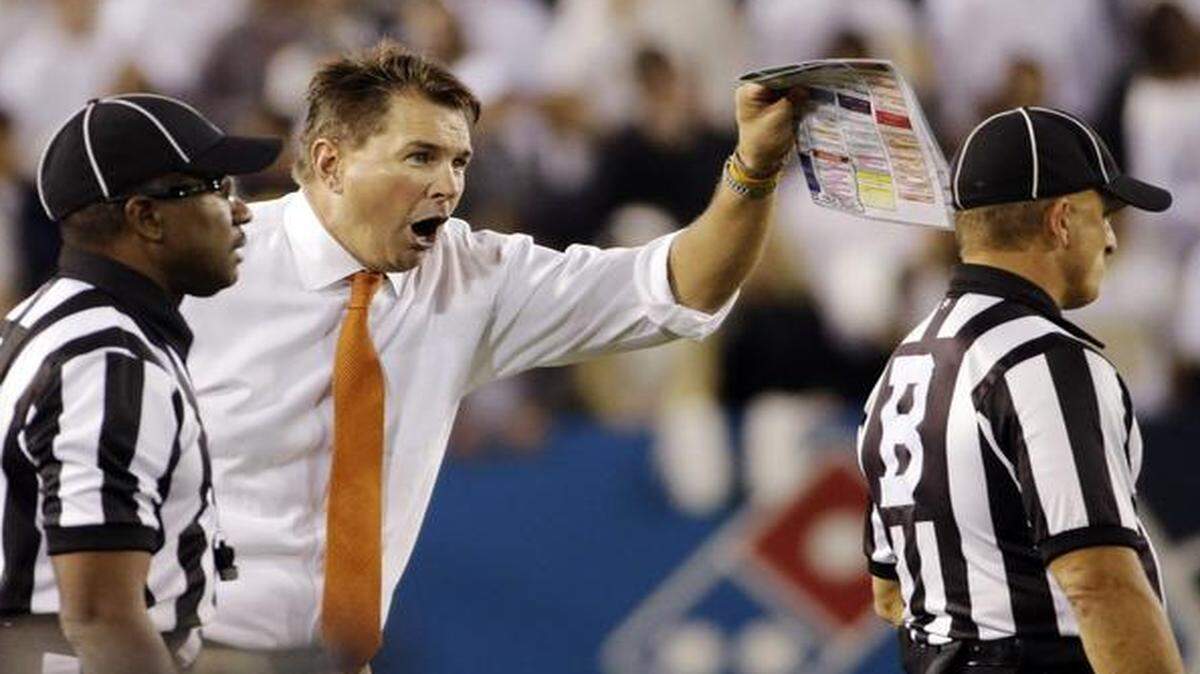 
UM coach Al Golden shouts at an official during a loss against Georgia Tech, Saturday, Oct. 4, 2014, in Atlanta. 
