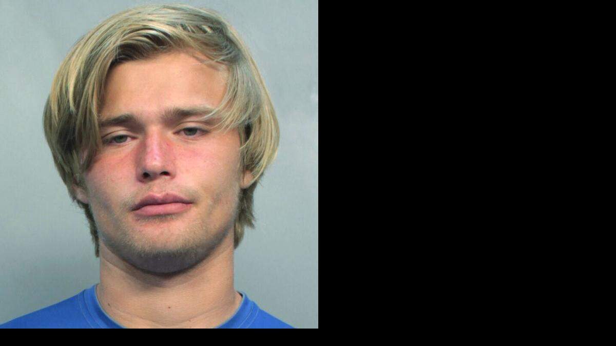 
This photo provided by Miami-Dade Corrections Department shows University of Miami backup quarterback Kevin Olsen under arrest, Monday, Sept. 15, 2014. Olsen was charged with driving under the influence and possession of a fake or stolen driver's license.
