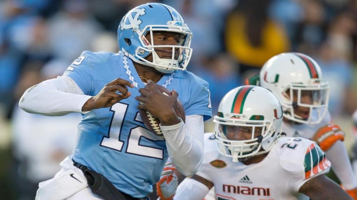 North Carolina quarterback Marquise Williams runs for his second touchdown against Miami during the first half of an NCAA college football game, in Chapel Hill, N.C., Saturday, Nov. 14, 2015.