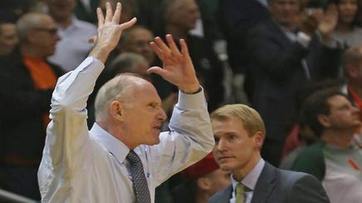 
UM coach Jim Larrañaga gets the crowd pumped up after being whistled for a technical foul during a game against Virginia Tech on Wednesday, Feb. 18, 2015 at BankUnited Center in Coral Gables.
