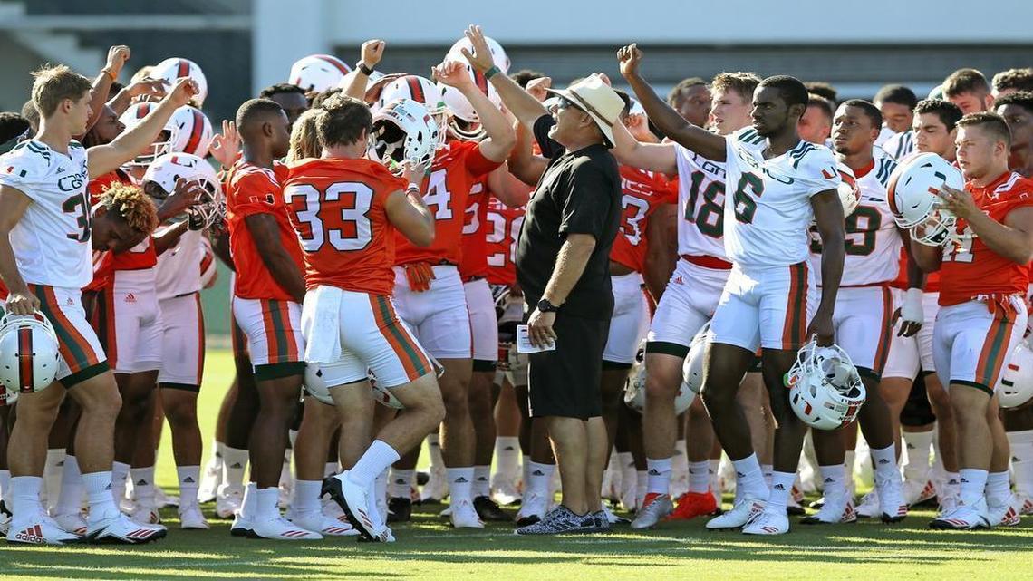 UM head coach Mark Richt huddles with players this past fall camp. The Canes were still in Orlando on Wednesday preparing for Toledo after Hurricane Irma.