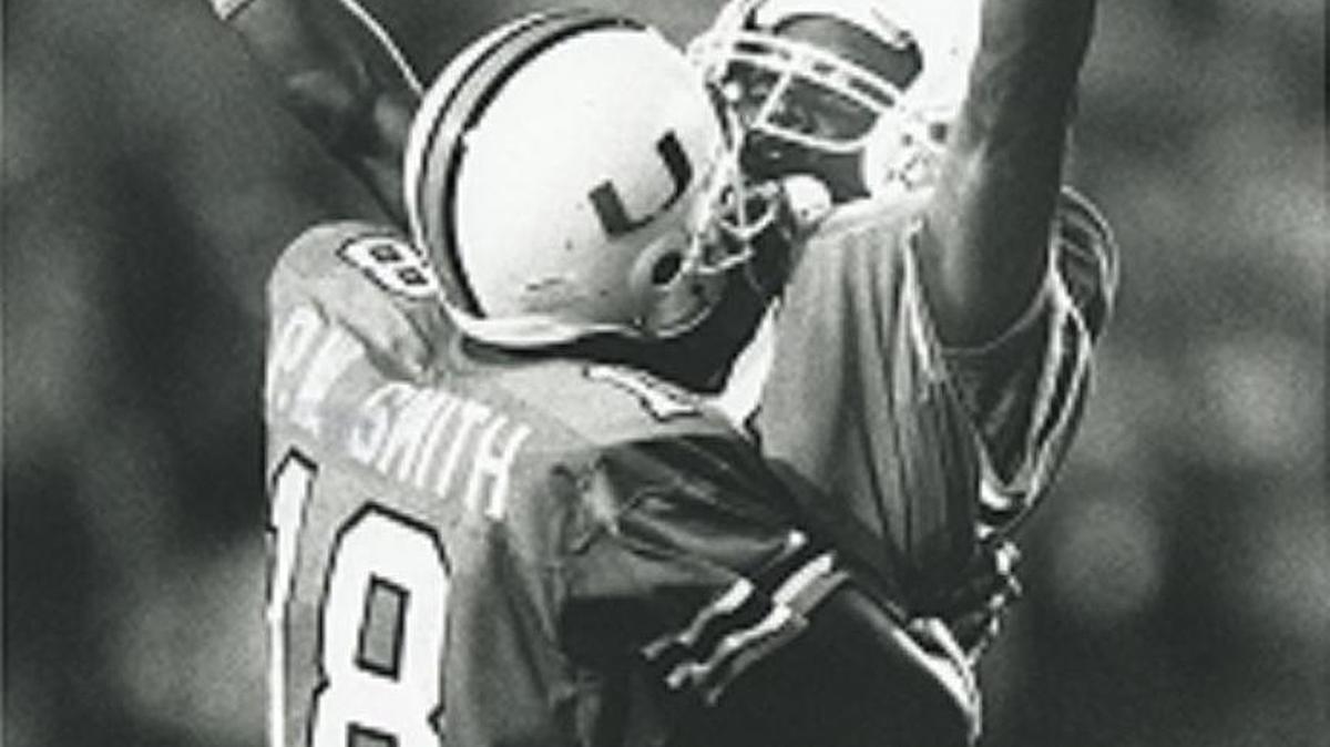 Pee Wee Smith and Randal Hill celebrate during the University of Miami’s 1989 victory over Notre Dame during which Hill caught a 44-yard bomb for a first down on third-and-44.