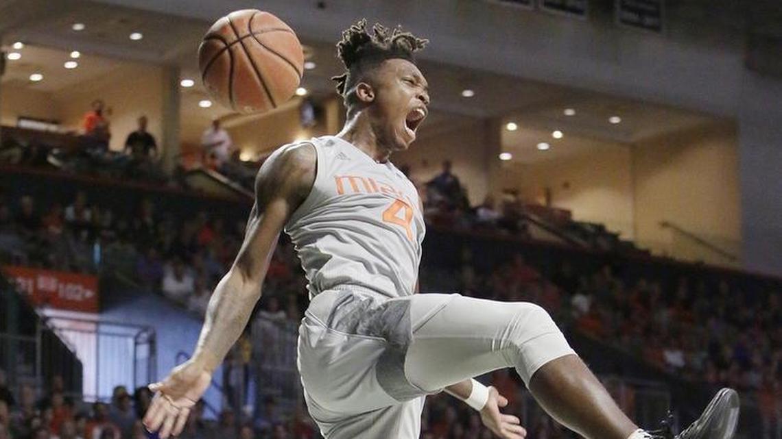 The Hurricanes’ Lonnie Walker IV dunks during a game against Syracuse on Feb. 17.