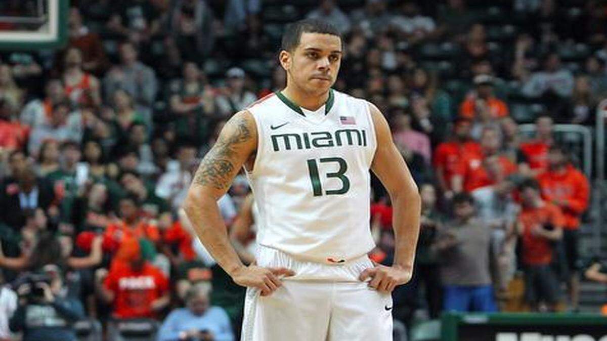 
Miami Hurricanes guard Angel Rodriguez watches during the second half of their game against the Georgia Tech Yellow Jackets at the BankUnited Center in Coral Gables on Wednesday, Jan. 28, 2015.
