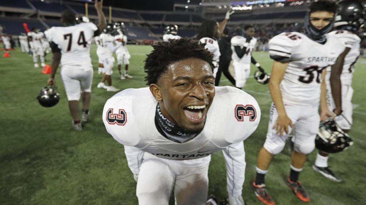 Southridge wide receiver Mark Pope (3) celebrates on the sidelines after catching a fourth-quarter touchdown pass to take the lead as Miami Southridge beat Orlando Dr. Phillips for the Class 8A state championship at Camping World Stadium in Orlando on Saturday, December 10, 2016