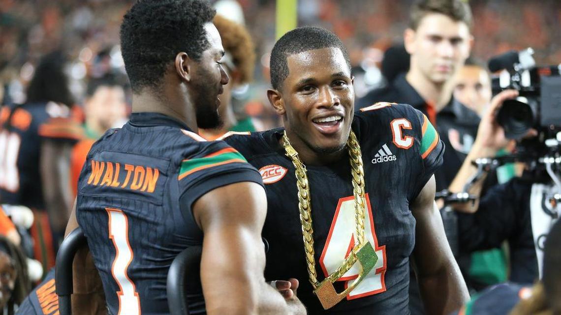 Miami Hurricanes safety Jaquan Johnson receives the turnover chain against Virginia Tech at Hard Rock Stadium on Sat., Nov. 4, 2017.