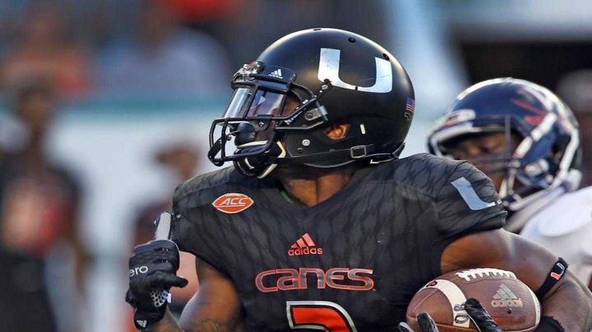 Miami Hurricanes Stacy Coley runs for a touchdown against the Virginia Cavaliers at Sun Life Stadium in Miami Gardens in November.
