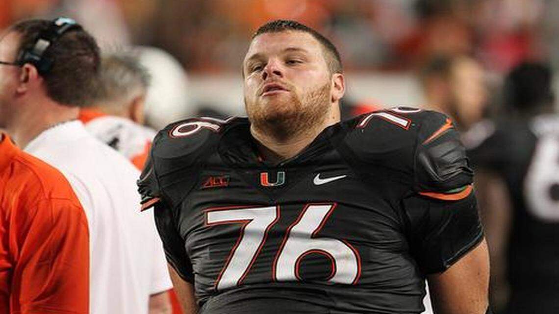 
Taylor Gadbois of the University of Miami sits with ice on his knee after leaving the game in the fourth quarter. The University of Miami Hurricanes played the Duke University Blue Devils at Sun Life Stadium in Miami Gardens, Florida.
