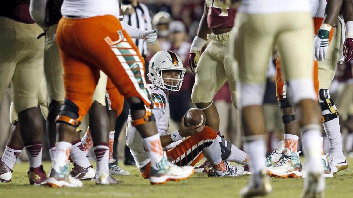 
UM quarterback Brad Kaaya is sacked in the first quarter against Florida State at Doak Campbell Stadium in Tallahassee on Saturday, Oct. 10, 2015.
