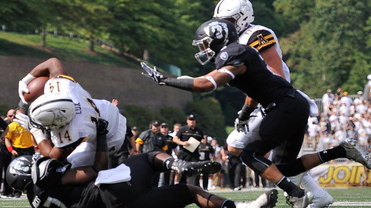 Appalachian State running back Marcus Cox (14) rolls into the end zone during Saturday’s home victory over Old Dominion. Cox, who has 248 yards and three touchdowns this season, entered 2016 as the nation’s second-leading rusher, with 4,272 yards.