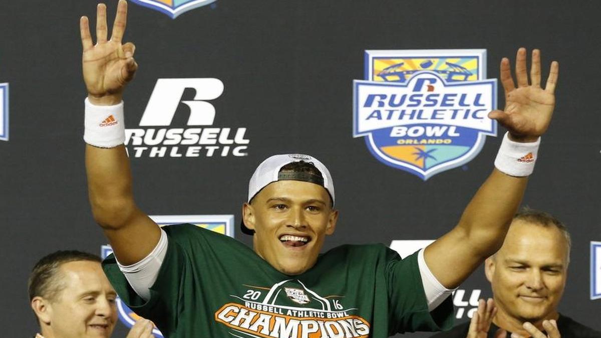 Miami Hurricanes quarterback Brad Kaaya (15) celebrates after the University of Miami defeats West Virginia Mountaineers at the Russell Athletic Bowl in Orlando Wed., Dec. 28, 2016.