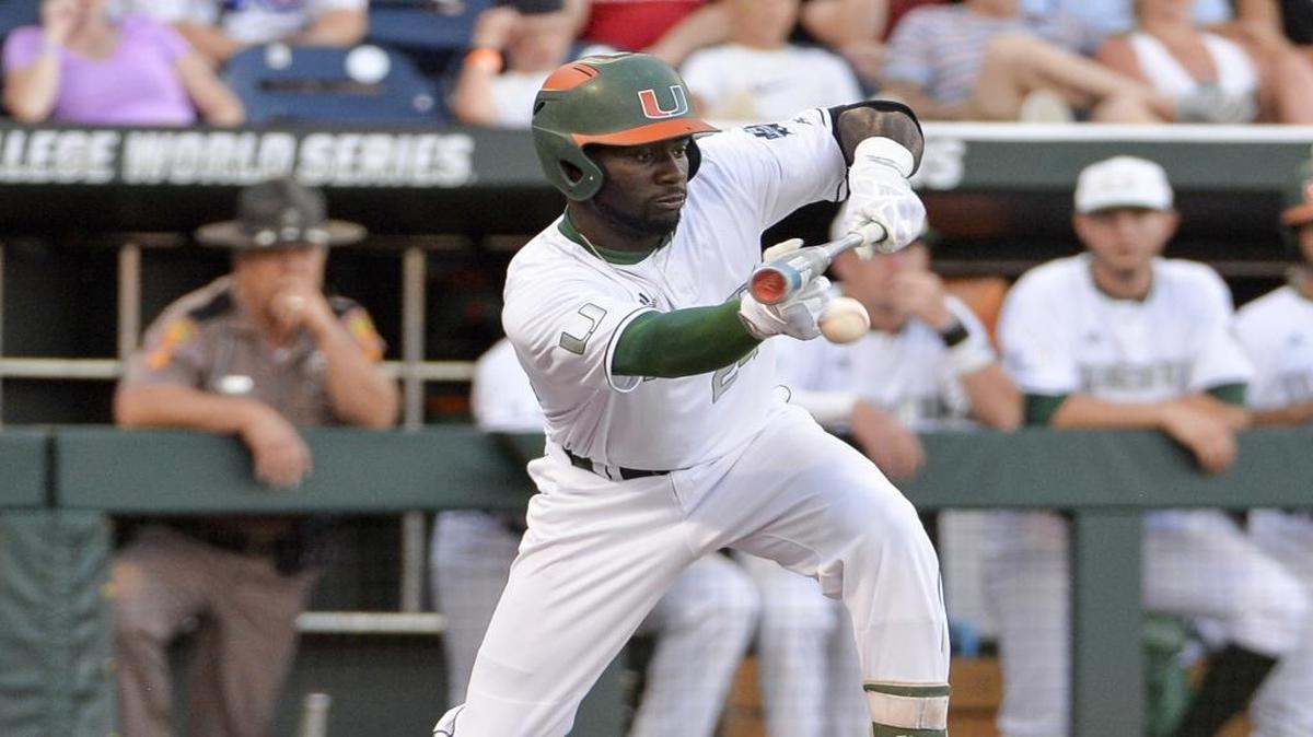 Miami's Jacob Heyward bunts in the fourth inning of Saturday’s loss to Arizona. Despite outhitting the Wildcats, the Hurricanes could only muster one run.