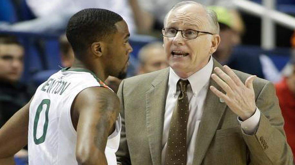 
UM coach Jim Larrañaga, shown with guard Ja’Quan Newton, said of the NCAA Tournament selection committee: “If we get an at-large bid, I think we’ll prove them right.” 
