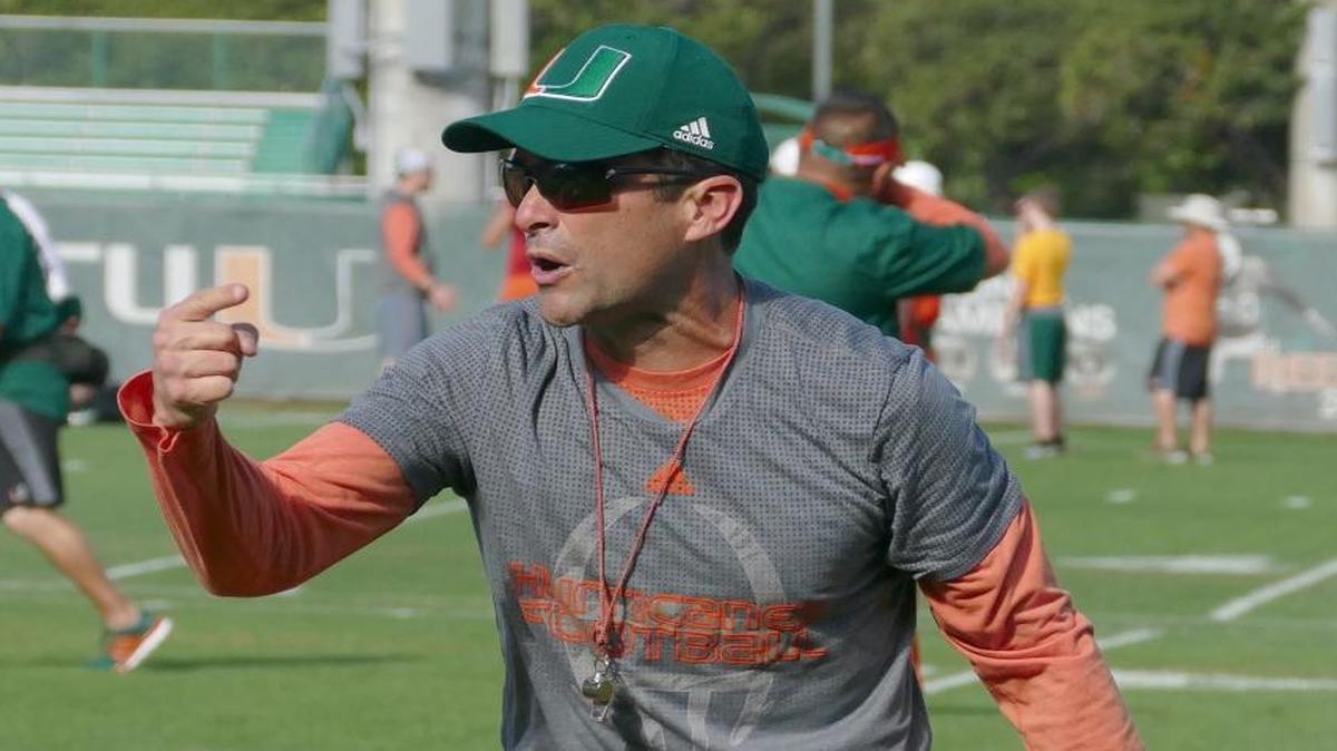 Manny Diaz, defensive coordinator and linebacker coach for the University of Miami football team, gestures during practice on Thurs., March 17, 2016.
