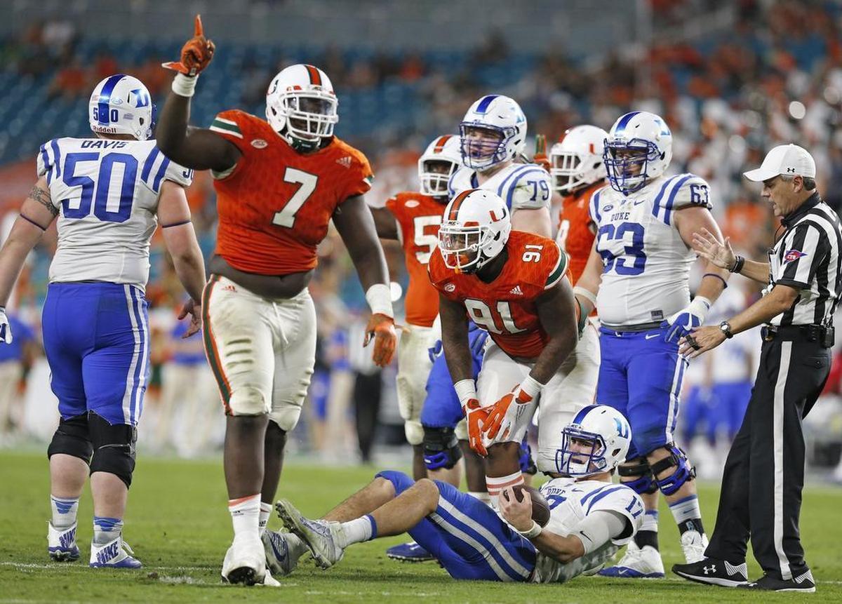 Miami Hurricanes defensive tackle Kendrick Norton after Duke Blue Devils quarterback Daniel Jones is sacked at Hard Rock Stadium on Saturday, November 26, 2016.