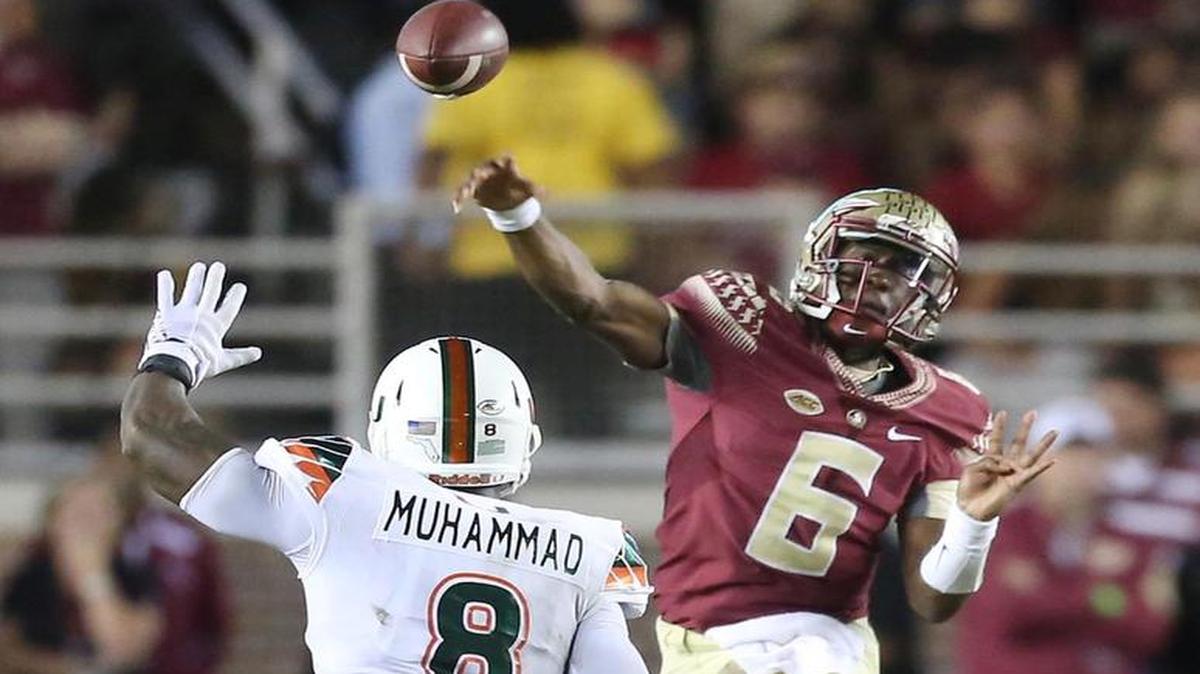 
Florida State quarterback Everett Golson throws over UM defensive lineman Al-Quadin Muhammad at Doak Campbell Stadium in Tallahassee, Fla., on Saturday, Oct. 10, 2015. 
