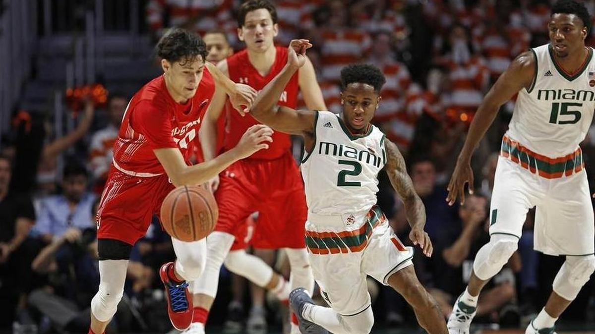 University of Miami freshman guard Chris Lykes (2) is only 5-7, but he has big game and is making a big impact on the undefeated sixth-ranked Hurricanes.