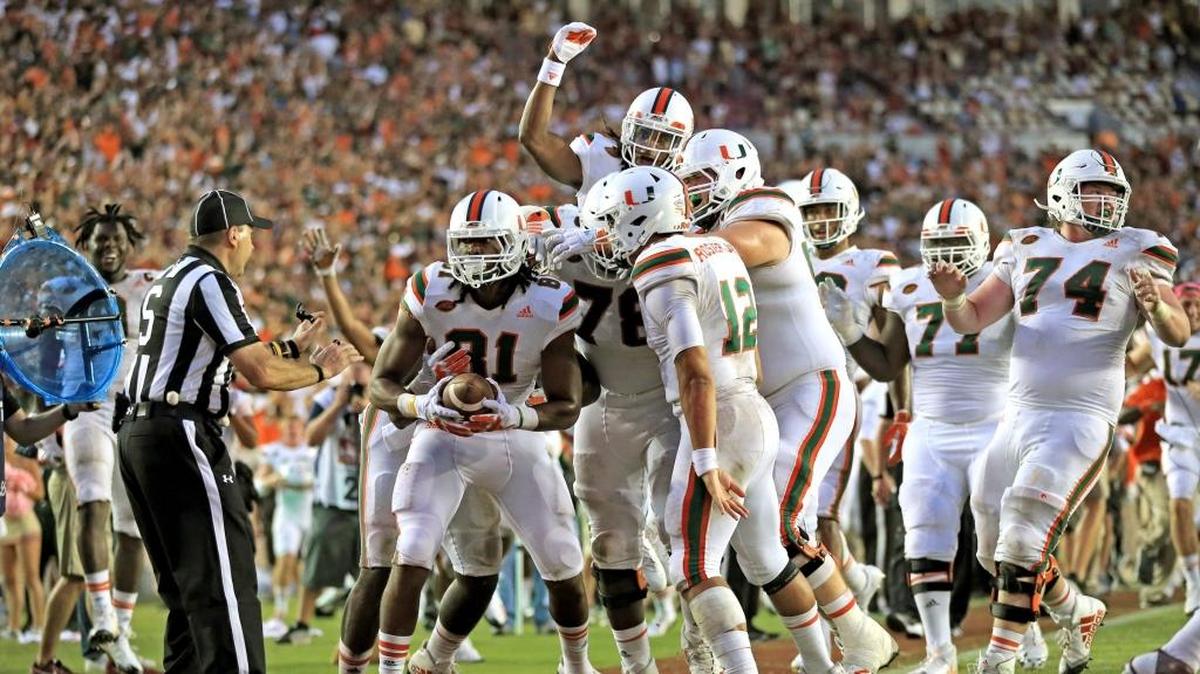 Miami Hurricanes wide receiver Darrell Langham scores the winning touchdown at Florida State with just seconds remaining in the game at Doak Campbell Stadium in Tallahassee on Saturday, Oct. 7, 2017.