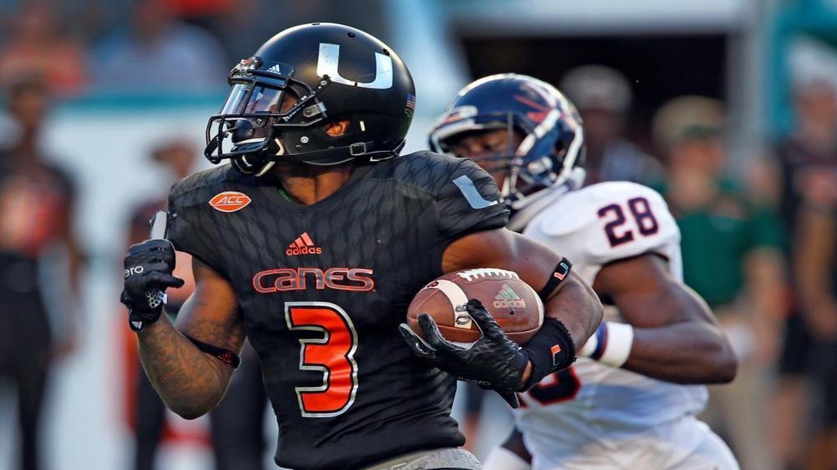 Miami Hurricanes Stacy Coley runs for a second quarter touchdown after a reception against the Virginia Cavaliers in this Nov. 7, 2015, file photo.
