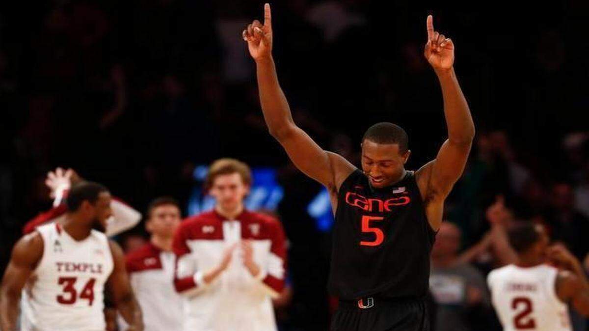 
Davon Reed of the Miami Hurricanes celebrates a victory over the Temple Owls during the NIT Championship semifinals at Madison Square Garden on March 31, 2015 in New York City. 
