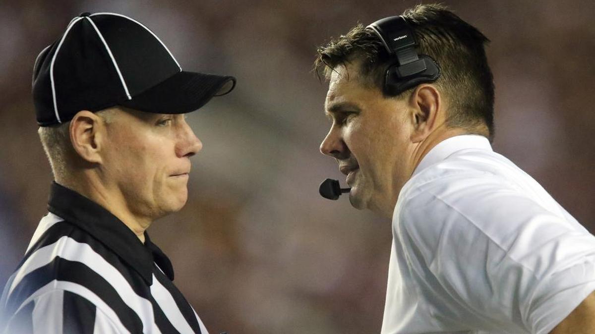 UM coach Al Golden talks with an official during a game against Florida State, Saturday, Oct. 10, 2015 in Tallahassee, Fla.