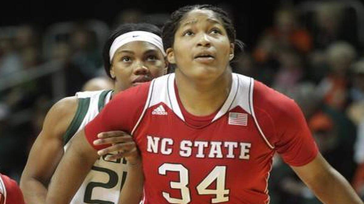 
UM’s Jassany Williams, center, battles for position during a game against N.C. State. 
