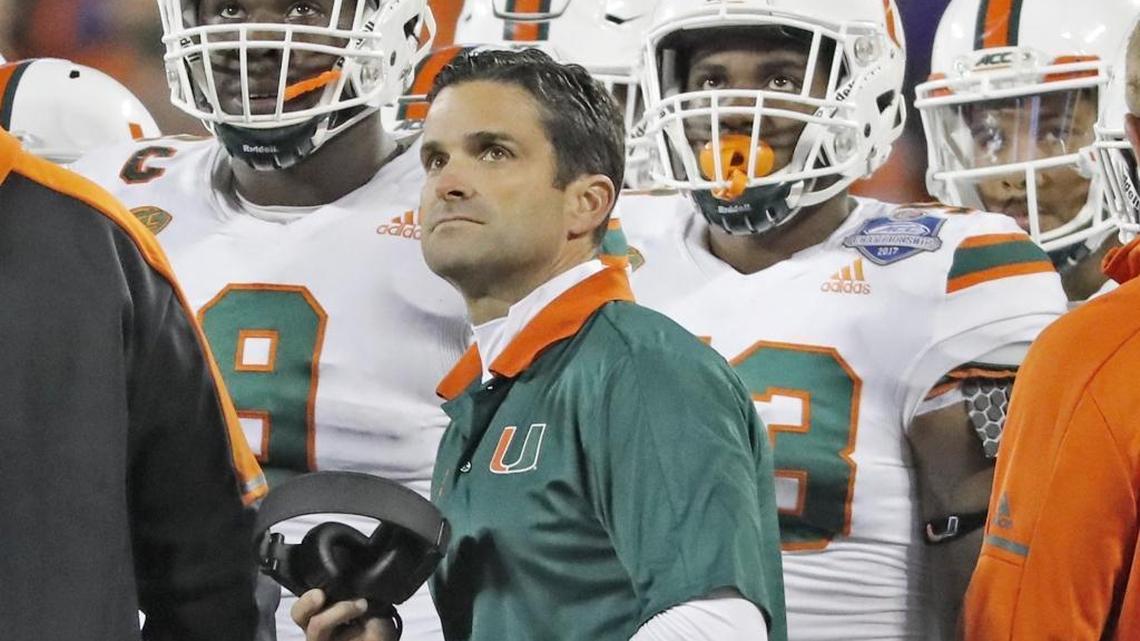 Defensive coach Manny Diaz with players in the first quarter as the University of Miami Hurricanes play the Clemson Tigers in the ACC Championship Game at Bank of America Stadium in Charlotte, N.C., on Dec. 2, 2017.