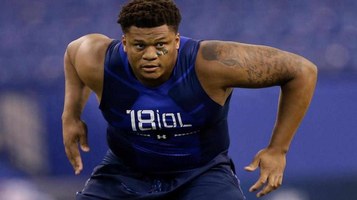 
UM offensive lineman Ereck Flowers runs a drill at the NFL football scouting combine in Indianapolis, Friday, Feb. 20, 2015. 

