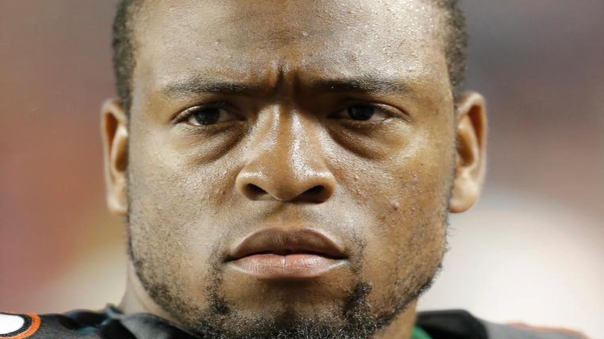 
Miami defensive lineman Jelani Hamilton is shown on the sideline during the first half of an NCAA college football game against Virginia Tech, Saturday, Nov. 9, 2013, in Miami Gardens, Fla. 
