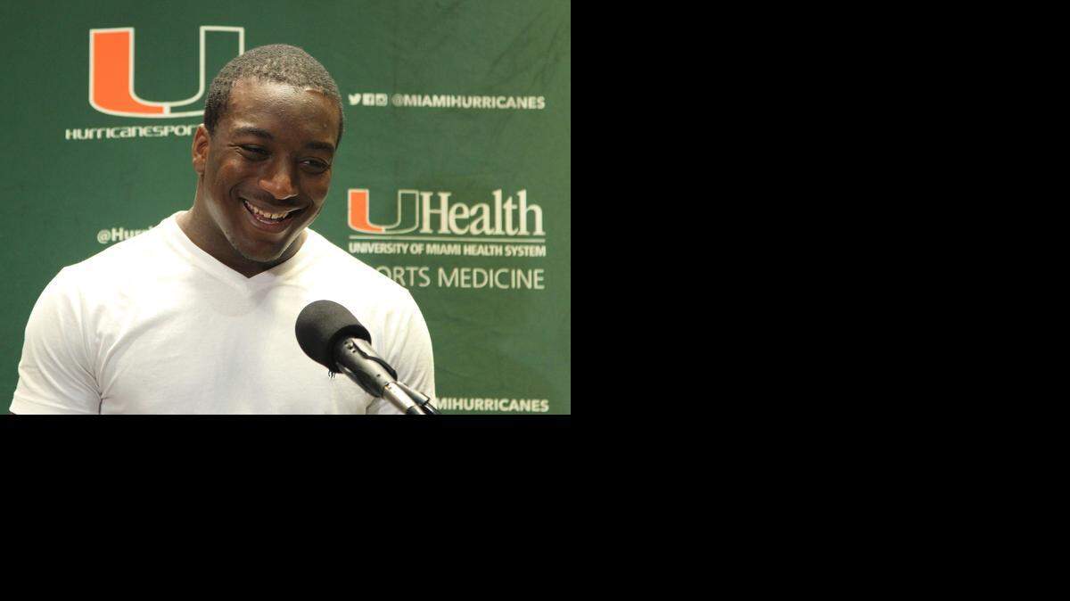 
UM running back Duke Johnson announces his plans to go pro next season during his press conference on Sunday, Dec. 28, 2014, at the University of Miami in Coral Gables.

