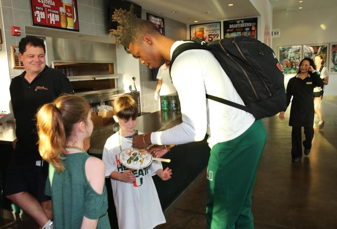 University of Miami guard Lonnie Walker signs autographs at the NCAA basketball selection show viewing party at the Rathskeller on UM’s Coral Gables campus on Sunday, March 11, 2018, after the team was selected to play Loyola-Chicago of Illinois next Thursday in the first round of the South regional of the NCAA basketball tournament.