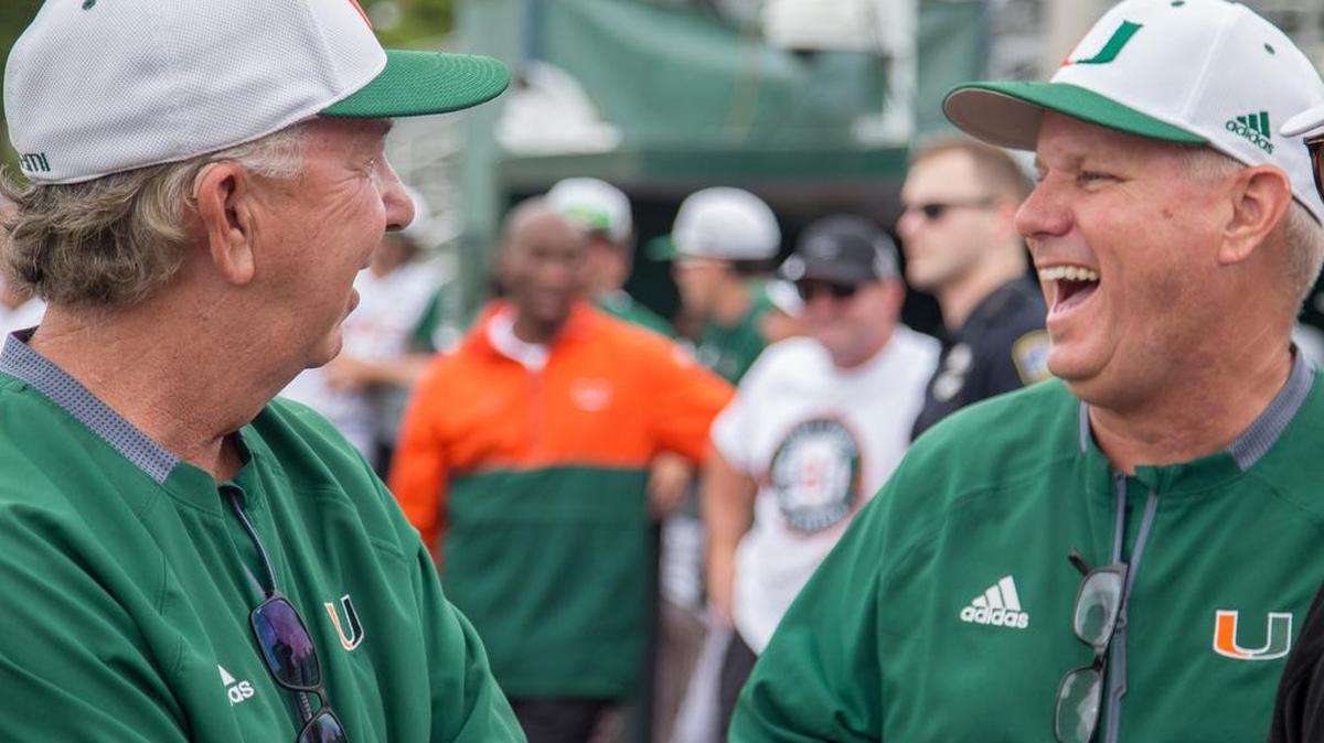 University of Miami’s new head baseball coach, Gino DiMare, shares a humorous moment with former head coach Jim Morris before the game against Boston College at Mark Light Field in Coral Gables on Saturday, May 19, 2018. DiMare announced his new staff on Thursday, July 26, 2018.